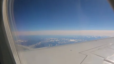 Horizon And Mountains From Plane Stock Footage 101877039