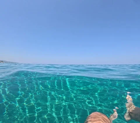 Horizon observed while bathing in the Mediterranean Sea Stock Footage 313331861