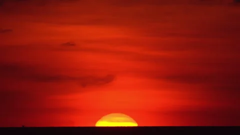 Horizon, red sun goes down Stock Footage 269140607