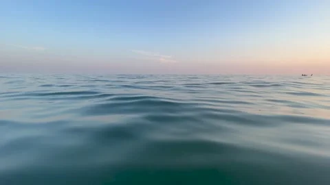 Horizon view from the sea at sunset Stock Footage 212875938