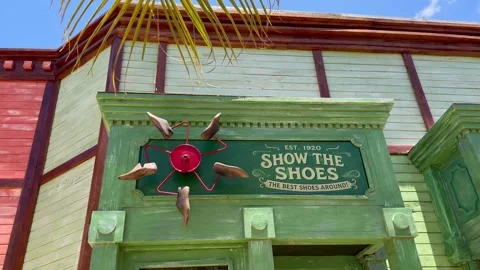 Horizontal 4K Quirky Shoe Windmill Attraction At Cabo Rojo Port Stock-Footage 335479506