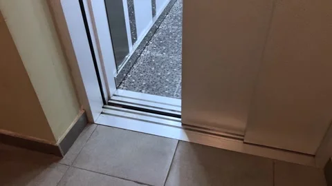 Horizontal 4K video.  Gray elevator doors close in residential building Stock Footage 341275258