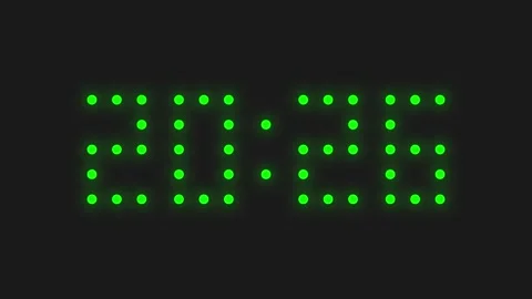 Horizontal 4K video. LED lights changes time from 20:25 to 20:26 Video stock 324769704