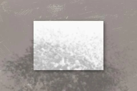 A horizontal A4 sheet of white textured paper on the grey wall background. Mo Stock Illustration