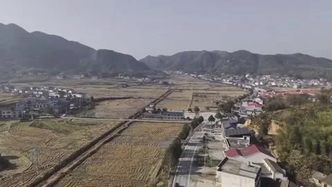 Horizontal Aerial Drone View of Modern Rural Village and Harvested Fields in Stock Footage 326089710