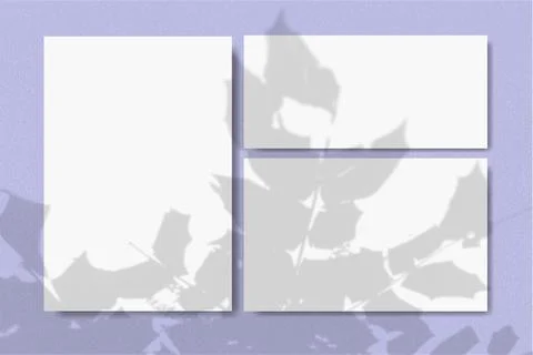 Horizontal and vertical sheets of white textured paper against a violet wall Stock Illustration