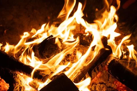 Horizontal Background of Firewood Heating up with Bright Flames. Foto stock