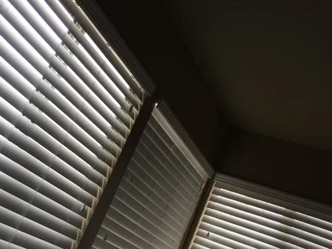Horizontal blinds sunlight pattern window Stock Photos