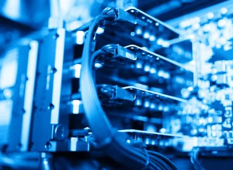 Horizontal blue gpu quad sli video card bokeh background Stock Photos