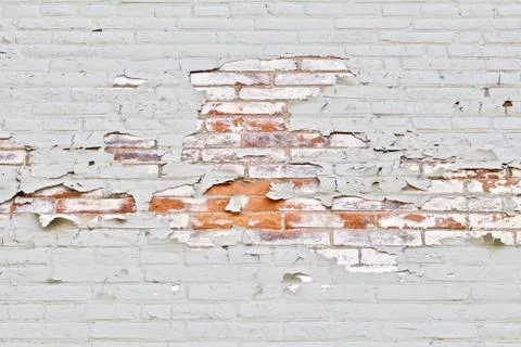 Horizontal Bricks and Peeling Gray Wall Stock Photos