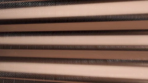 Horizontal brown lines on metallic background, seamless loop. Animation Stock Footage 111222635