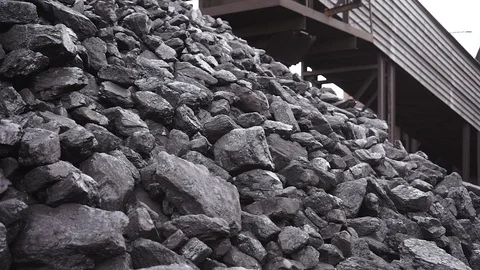 Horizontal camera wiring, coal in a coal warehouse Stock Footage 106395198