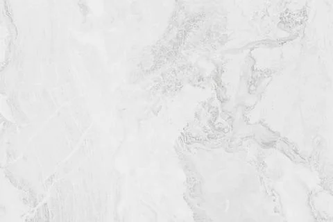 Horizontal close up overhead view of a seamless white marble stone texture .. Stock Photos