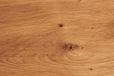 Horizontal close up overhead view of a warm golden brown wood texture with .. Stock Photos