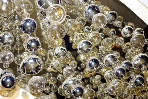 Horizontal close-up pattern image of several glass bubbles Stock Photos