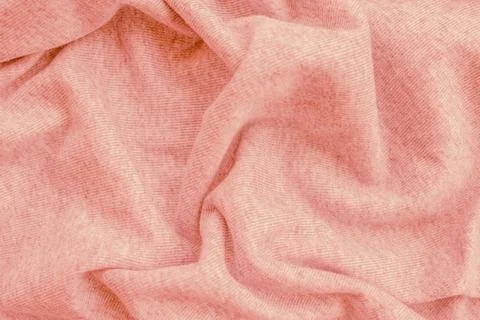 Horizontal close up shot of a soft pastel pink knitted cotton fabric materi.. Stock Photos