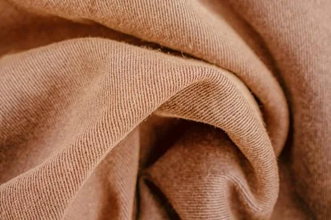 Horizontal close up of a soft brown cotton twill fabric showing detailed di.. Stock Photos