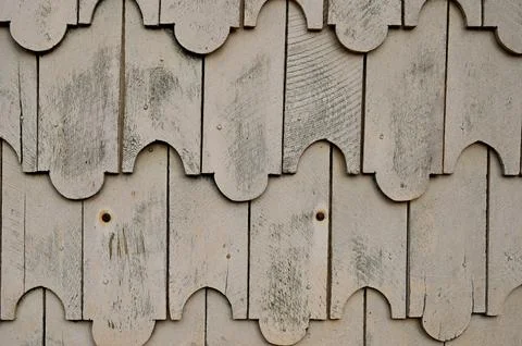 Horizontal color close-up image of old wooden tile pattern facade Stock Photos
