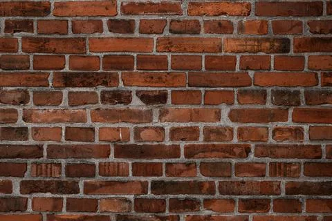 Horizontal dark red brick wall texture. Abstract background pattern Foto stock