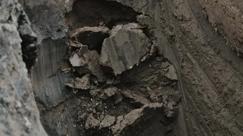 Horizontal directional drilling is used to install pipes underground. Stock Footage 318269743