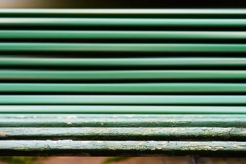 Horizontal dramatic park bench bokeh background Stock-Fotos