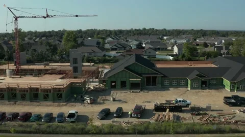 Horizontal drone shot of new construction site Stock Footage 238962650