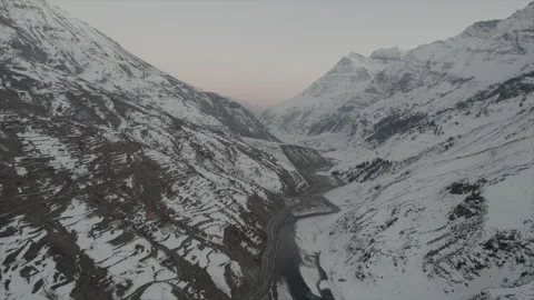 Horizontal drone video of Snow Covered Mountains (RAW, unedited) Stock Footage 324940603