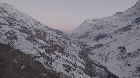 Horizontal drone video of Snow Covered Mountains (RAW, unedited) Stock Footage 324940623