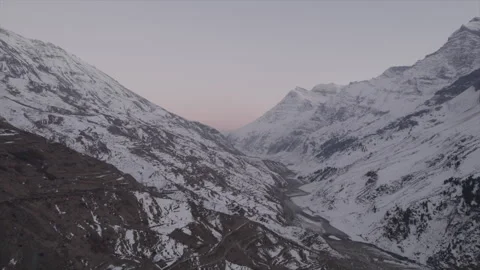Horizontal drone video of Snow Covered Mountains (RAW, unedited) Stock Footage 324940692