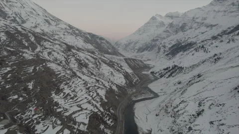 Horizontal drone video of Snow Covered Mountains (RAW, unedited) Stock Footage 324940724