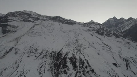 Horizontal drone video of Snow Covered Mountains (RAW, unedited) Stock Footage 324940859