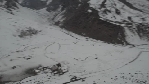Horizontal drone video of Snow Covered Mountains (RAW, unedited) Stock Footage 324940982
