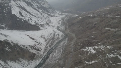 Horizontal drone video of Snow Covered Mountains (RAW, unedited) Stock Footage 324941115