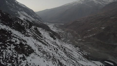 Horizontal drone video of Snow Covered Mountains (RAW, unedited) Stock Footage 324941121
