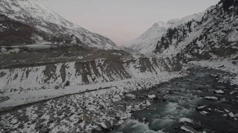 Horizontal drone video of Snow Covered Mountains (RAW, unedited) Stock Footage 324941156