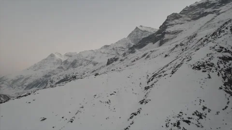 Horizontal drone video of Snow Covered Mountains (RAW, unedited) Stock Footage 324941171
