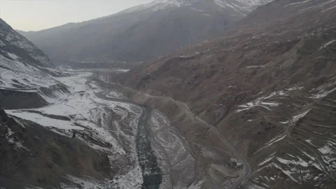 Horizontal drone video of Snow Covered Mountains (RAW, unedited) Stock Footage 324941222