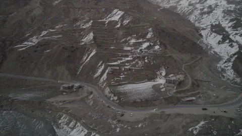 Horizontal drone video of Snow Covered Mountains (RAW, unedited) Stock Footage 324941316