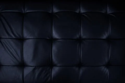 Horizontal elegant black leather texture with buttons for pattern and backgro Stock Photos