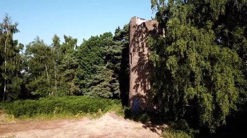 Horizontal flying to reveal a stone built tower Stock Footage 140799463