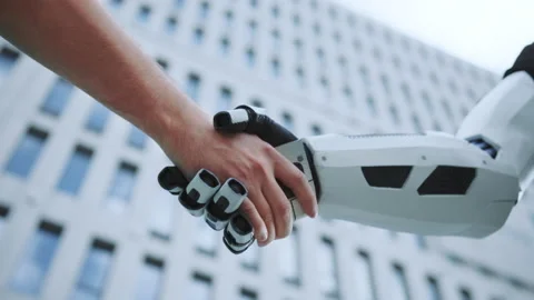 Horizontal footage of human and machine. Caucasian man shaking robot hand on Video stock 233893666