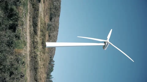  Horizontal footage of wind mill park  with pale blue sky. Stock Footage 170667816