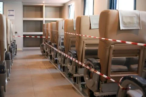 Horizontal Frame of an Empty Modern Train Car Interior with Beige Seats Sectione Foto stock