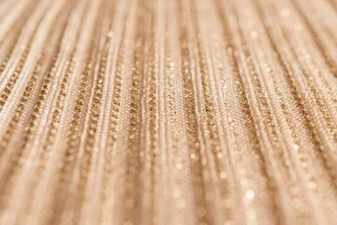 Horizontal gold background with vertical perspective lines and partial blur. Stock Photos