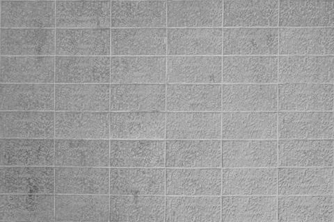 The horizontal gray cement block wall texture and background are very elegant Stock Photos