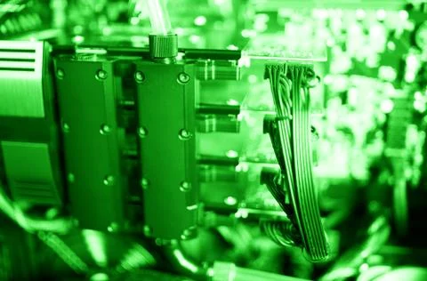 Horizontal green gpu quad sli video card bokeh background Stock Photos
