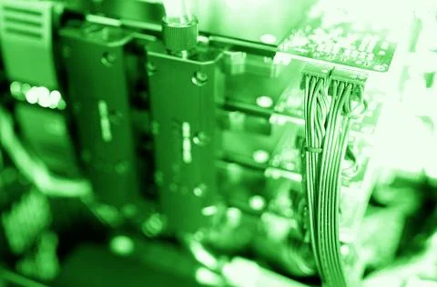 Horizontal green gpu quad sli video card bokeh background Stock Photos