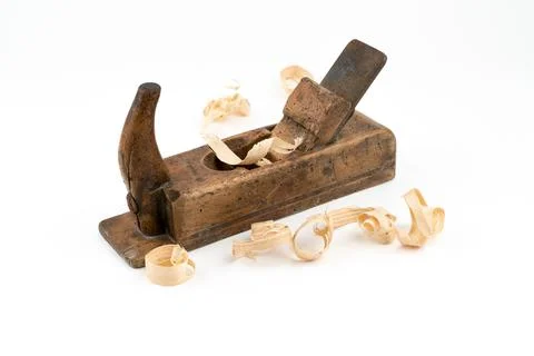Horizontal high angle angle studio shot of small vintage wood planer isolated on Stock Photos