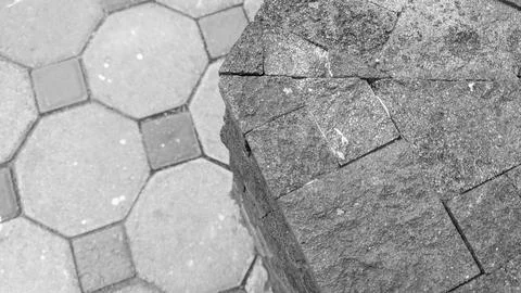A horizontal high angle perspective captures a rough textured masonry stone.. Stock Photos