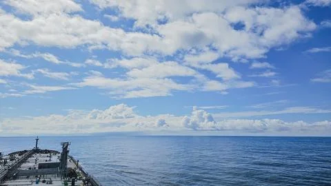 Horizontal high angle view of a large tanker vessel sailing in the calm ope.. Stock Photos